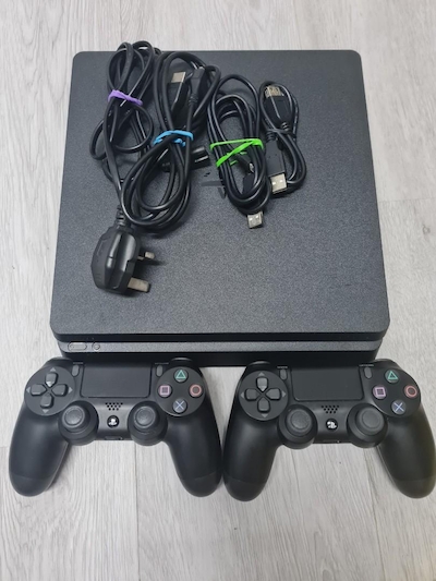 کنسول بازی سونی استوک مدل PS4 Slim ظرفیت یک ترابایت کپی خور به همراه دسته اضافه